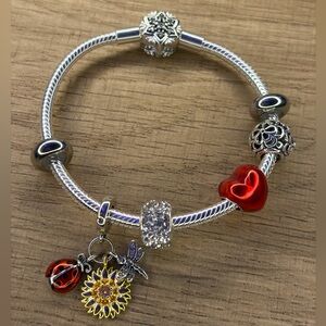 Pandora-style 925 silver bracelet with red heart and floral charms/dragonfly
